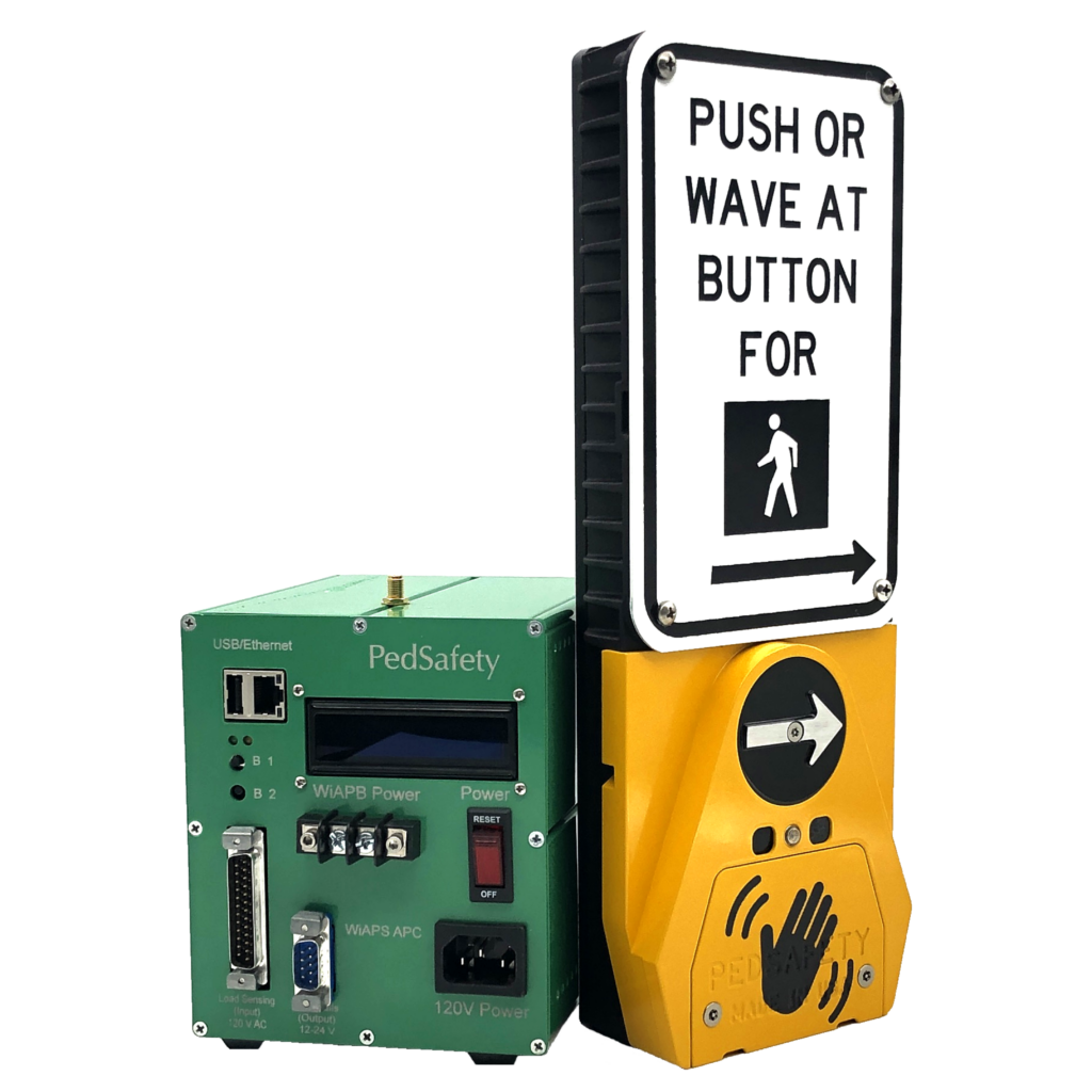 Product Overview:
Wireless Advanced Accessible Pedestrian Signal Wave (WiAAPS® Wave) is a networked 2-wire APS that utilizes the 2 existing field wires that are commonly used for pedestrian push buttons to power each Wireless Accessible Pedestrian Button (WiAPB). Should there be no existing field wires, your conduit is crushed, or you have no room to fit more wires in your conduit, the WiAAPS® Wave can draw power from the Pedestrian Signal Heads through SPI to have a true 0-wire system where no wires run back to the cabinet. Like our other APS devices, the WiAPBs provide pedestrians with audible, visual, and tactile cues, as well as extended press and clearance phase indicator options, ensuring full  MUTCD (December 2023), PROWAG (September 2023), ADA, and TAC compliance. With the WiAAPS® Wave, your audio files, settings, profiles, and configurations reside in the Wireless Accessible Pedestrian Controller (WiAPC), which resides in the cabinet, and can be accessed through an ethernet cable. The WiAAPS® Wave additionally features the inclusion of our wave touchless technology allowing calls to be placed with the wave of a hand. A call is detected by an active infrared sensor as infrared light precisely reflects off the hand, ensuring calls are initiated only when intended. The touchless feature is separate from the physical button and provides pedestrians with a second form of actuation. Its simple setup and web-based management are designed for remote monitoring and configuration.


About the Product:
The WiAAPS® Wave is perfect for large or complex intersections as it has the capability to control up to 16 WiAPBs. The WiAPC maintains continuous communication with each WiAPB within a network-based control system and operates wirelessly through a secure 900MHz narrow-band communication. Users are guaranteed both safety and security as well as reliability with the WiAAPS® Wave's mesh network protocol. Through direct Ethernet access or a remote network connection, users can monitor and control system parameters in real-time, as well as upload files directly to individual pedestrian stations or download reports generated by the WiAPC. Each system comes to you factory-configured and can be customized at the intersection with our user-friendly APS programming software.
[vc_btn title=